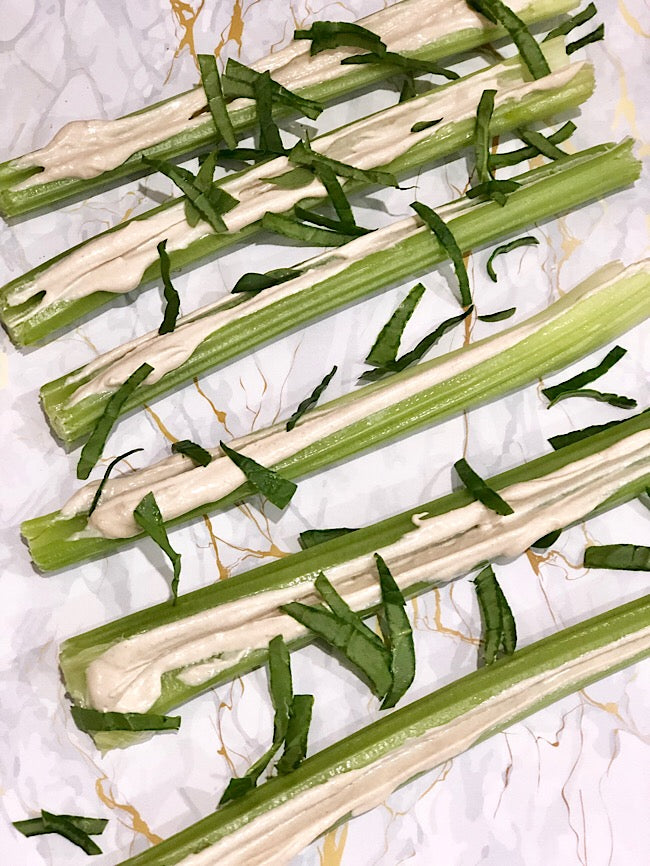 Celery tahini boats