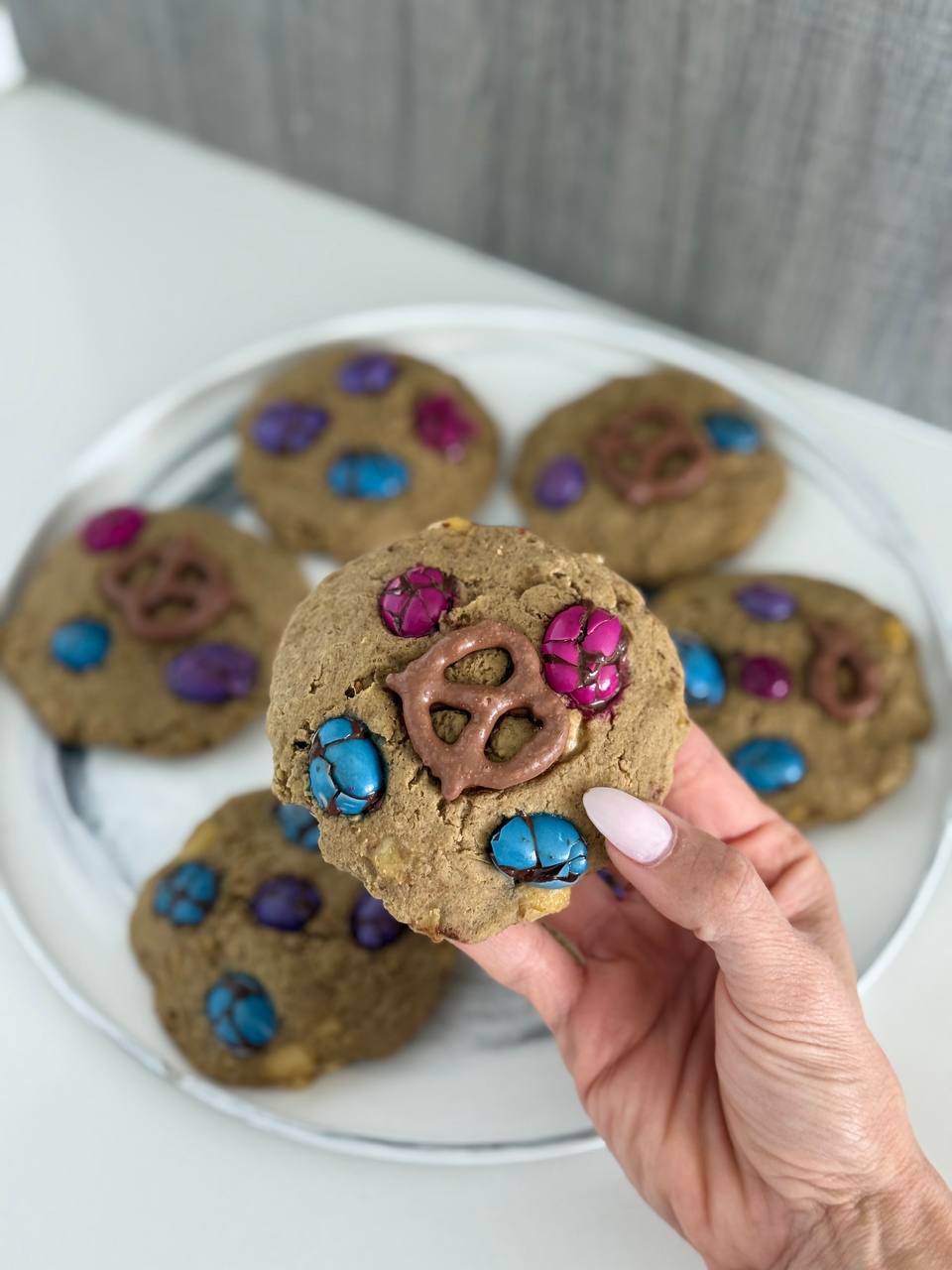 Chunky Monkey Cookies topped with colorful UNREAL Snacks pieces